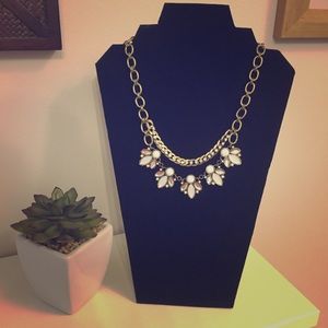 Gold and white necklace